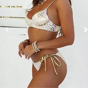 DOLL swimwear never worn! White and gold metallic top large bottom in medium
